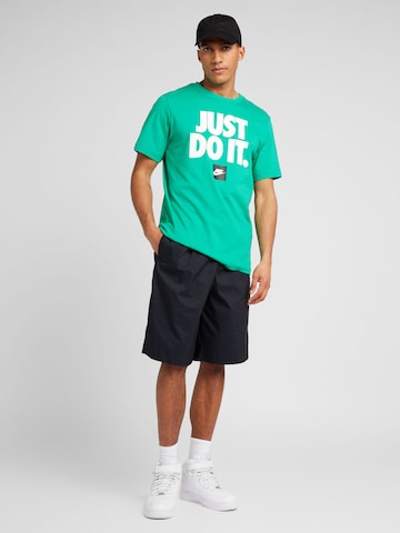 žalia Nike Sportswear Marškinėliai
