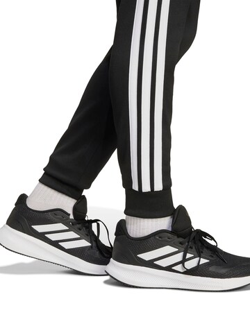 ADIDAS SPORTSWEAR Normalny krój Spodnie sportowe 'Ess' w kolorze czarny