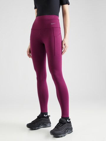 NIKE Skinny Workout Pants 'UNIVERSA' in Pink: front