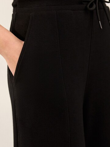 Next - Loosefit Pantalón en negro