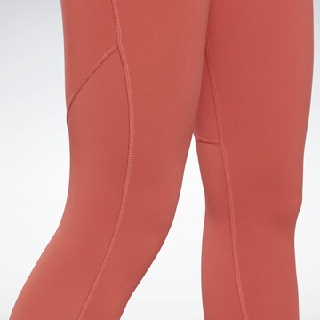 Skinny Pantalon de sport 'Beyond' Reebok en rouge