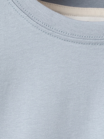 MANGO KIDS T-shirt 'BRAWLETS' i blå