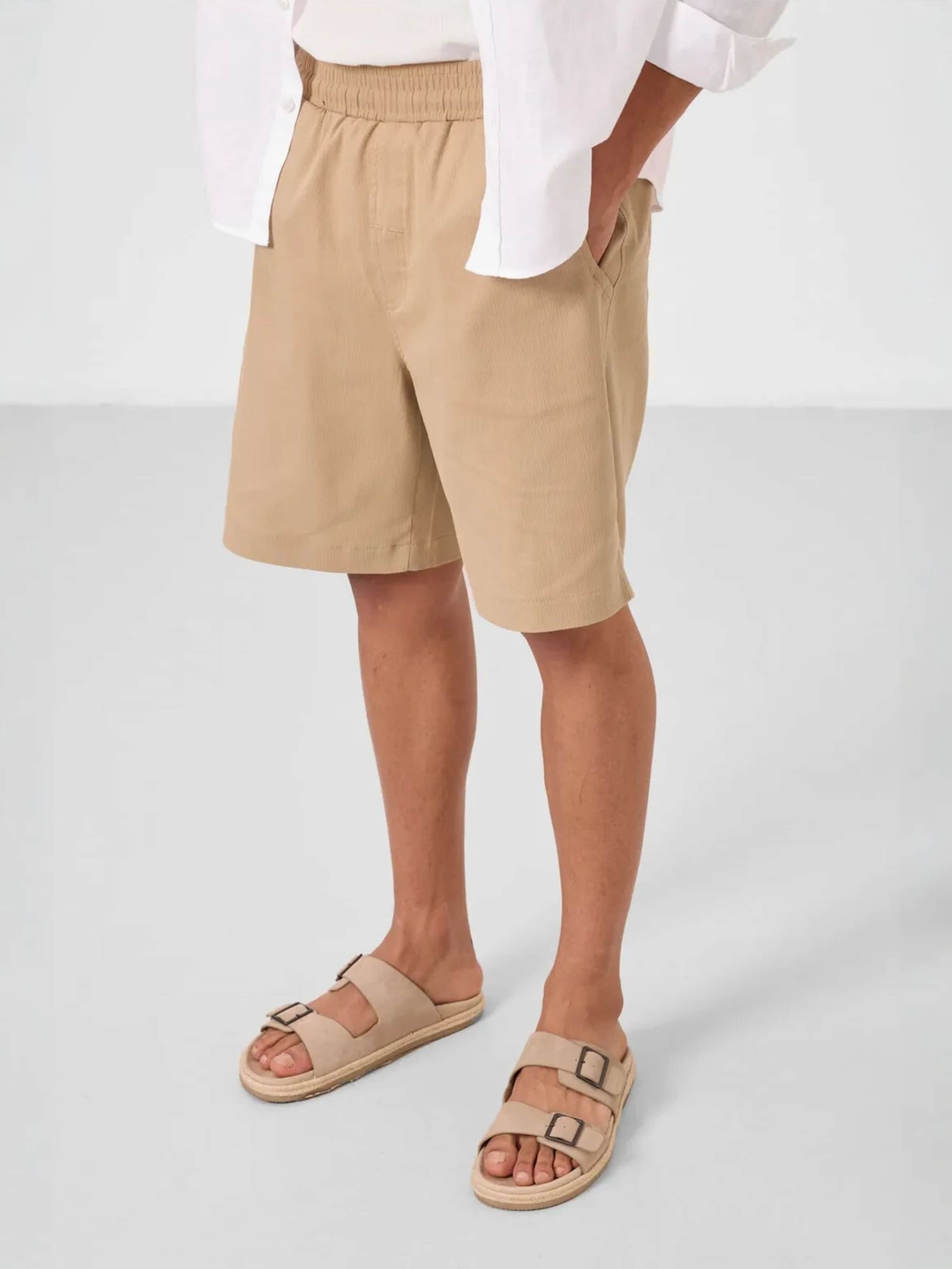 Regular Pantalon chino Tommy Life en marron