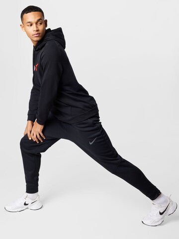 NIKE Tapered Sportbroek in Zwart