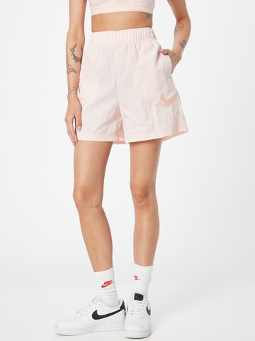 Nike Sportswear Широка кройка Панталон в розово: отпред