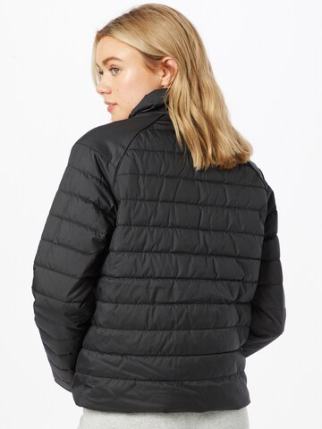 Veste de sport UNDER ARMOUR en noir