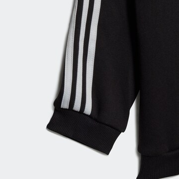 ADIDAS SPORTSWEAR Tepláková souprava 'Essentials ' – černá