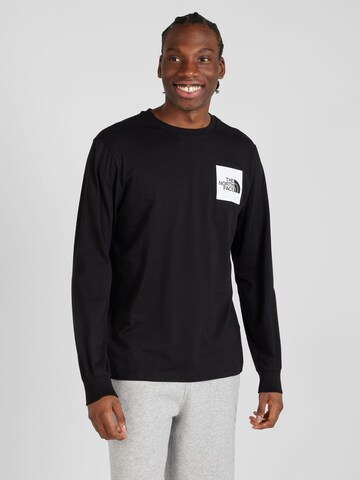 THE NORTH FACE - Camiseta en negro: frente