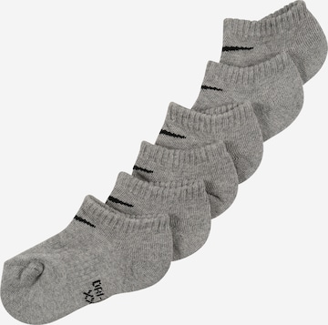 NIKE Athletic Socks in Grey: front