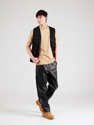 Maglietta 'Chase' di Carhartt WIP in marrone