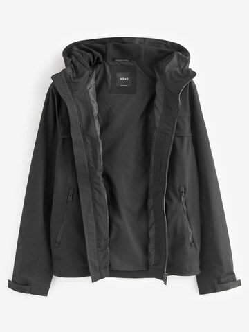 Veste fonctionnelle Next en noir