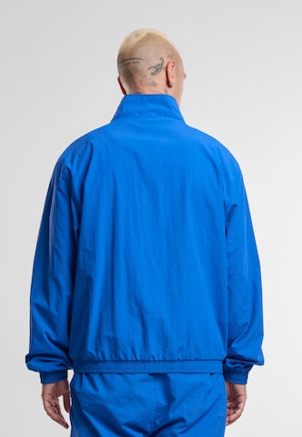 Karl Kani Between-Season Jacket 'Essential' in Blue