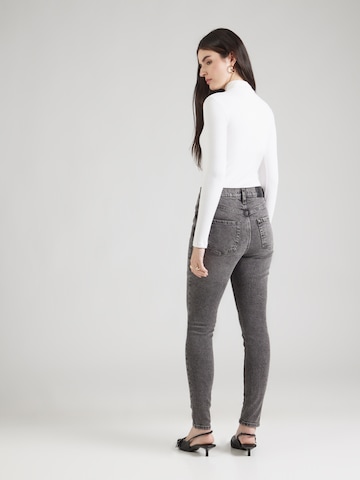 Skinny Jeans de la DKNY pe negru