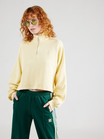 dzeltens ADIDAS ORIGINALS Sportisks džemperis 'Essentials+': no priekšpuses