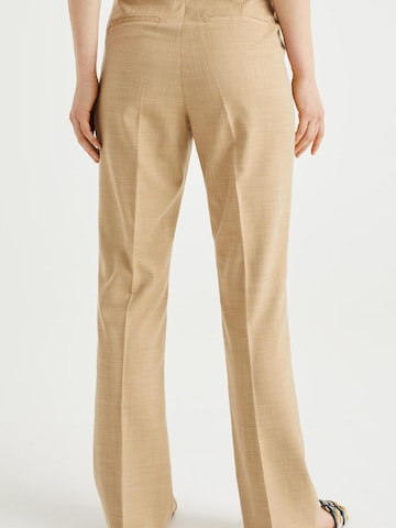 WE Fashion Boot cut Trousers with creases in Beige