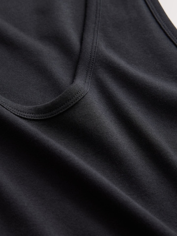 Next - Top en negro
