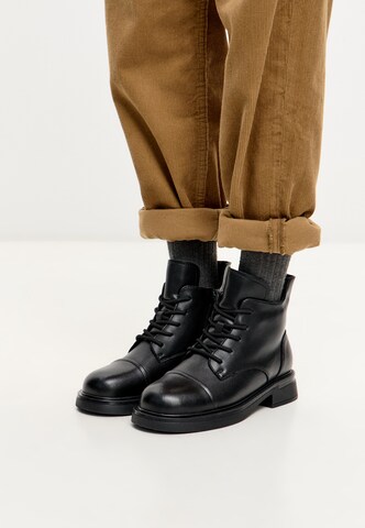 CESARE GASPARI Lace-up bootie in Black