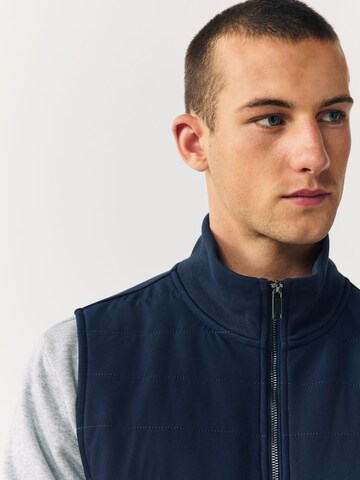 Next - Chaleco en azul