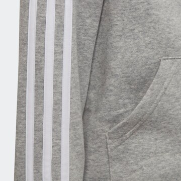 ADIDAS SPORTSWEAR Sportsweatjacke 'Essentials 3-Stripes Zip ' in Grau