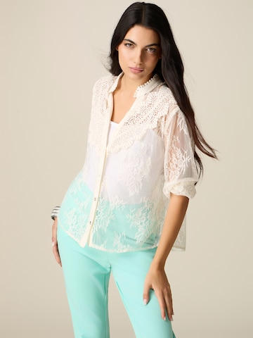 Camicia da donna di oltre in bianco