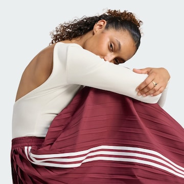 ADIDAS ORIGINALS - Pierna ancha Pantalón en rojo