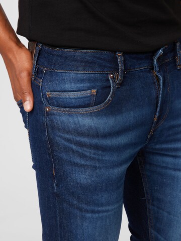 GUESS Skinny Jeans 'Chris' in Blauw