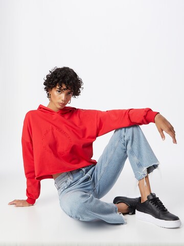 Sweat-shirt 'Malin' ABOUT YOU en rouge