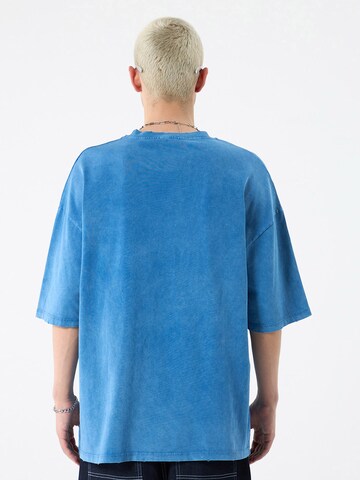 Maglietta di VAMOS CLO in blu
