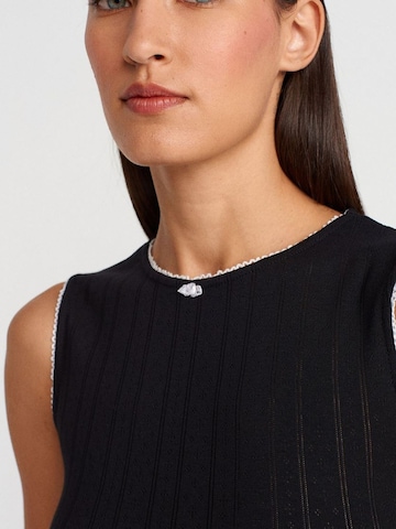 Top di Dilvin in nero