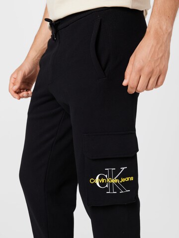 Calvin Klein Jeans Ozke Kargo hlače | črna barva