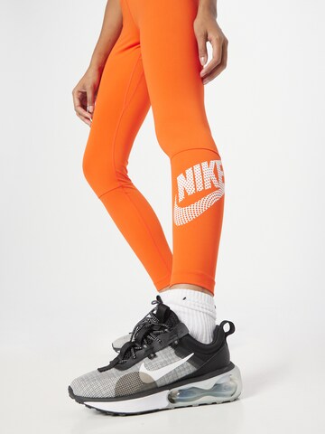 NIKE Skinny Športne hlače | oranžna barva