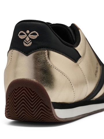 Baskets basses Hummel en or