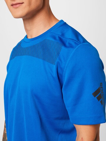 ADIDAS SPORTSWEAR Funkční tričko 'Workout Front Rack Impact Print' – modrá
