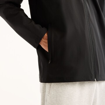 Giacca sportiva di new balance in nero