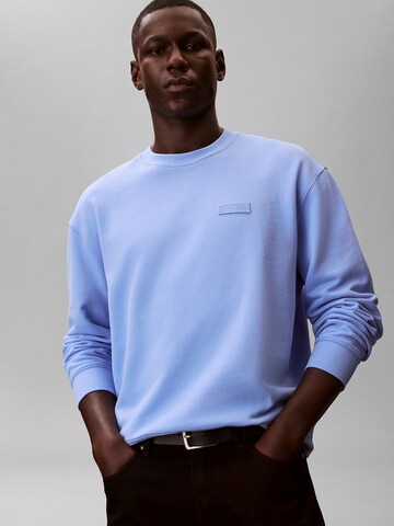 Calvin Klein Jeans Sweatshirt 'Terry Badge' in Blauw