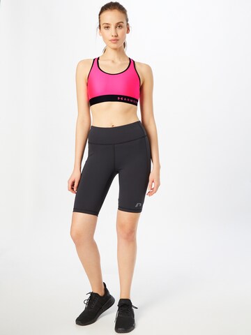 Bustier Soutien-gorge de sport 'Armour' UNDER ARMOUR en rose