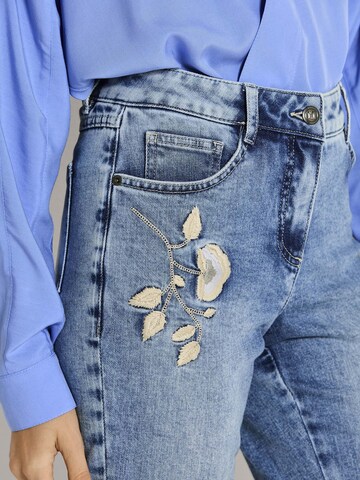 évasé Jean MADELEINE en bleu