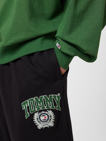 Tommy Jeans كنزة رياضية بلون أخضر
