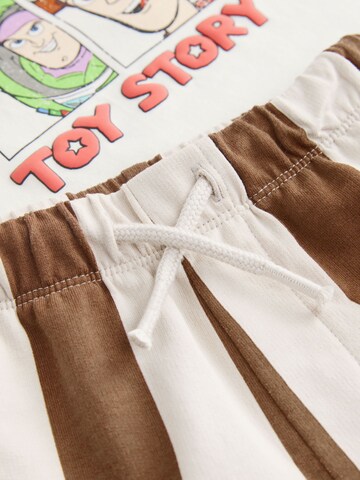 Next - Conjuntos 'Toy Story' em bege