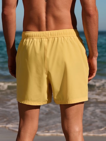 Next Badeshorts 'Motion-Flex' in Gelb