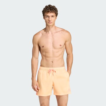 ADIDAS SPORTSWEAR Board shorts in Orange: front