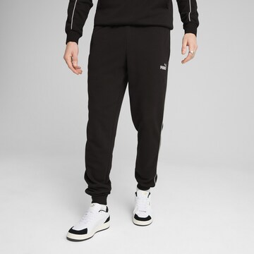 PUMA Tapered Sportbroek in Zwart: voorkant