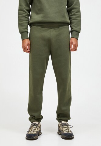 PEAK PERFORMANCE Regular Broek in Groen: voorkant