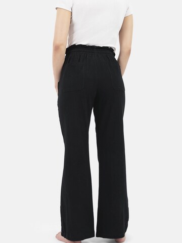 Squad the label Bootcut Hose in Schwarz