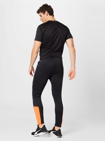 Slimfit Pantaloni sport de la PUMA pe negru