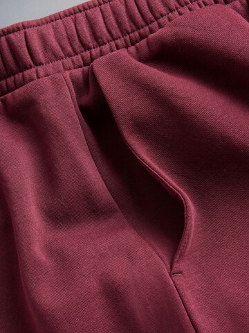 The Set Tapered Housut värissä harmaa