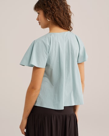 Bluză de la WE Fashion pe albastru