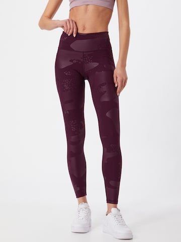 UNDER ARMOUR Skinny Workout Pants in Purple: front