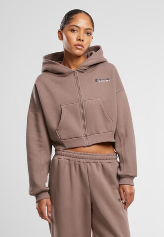 Karl Kani Zip-Up Hoodie in Brown: front