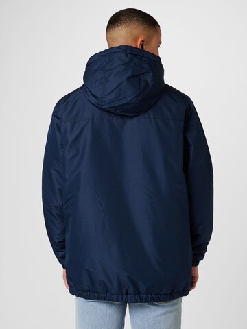 ELLESSE Демисезонная куртка в Синий